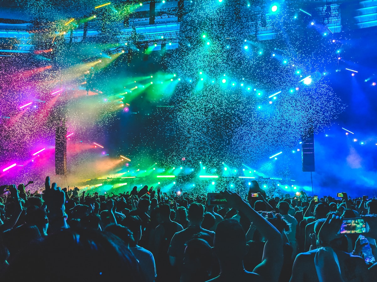 Concert crowd under stage lights (stock photo)